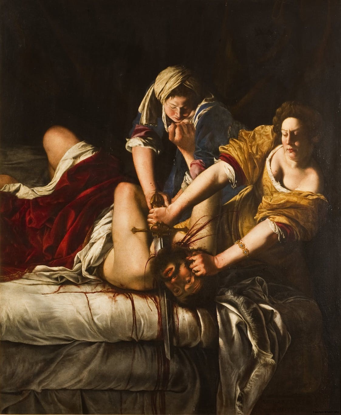 Judit_decapitando_a_Holofernes_por_Artemisia_Gentileschi.jpg